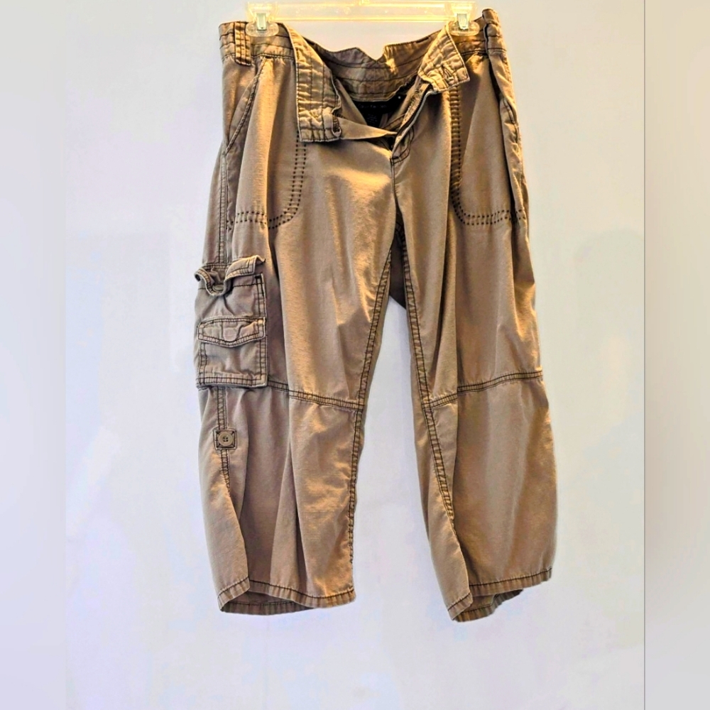 Calvin Klein capris with pockets and buttons for folding shorter. Tan size 12